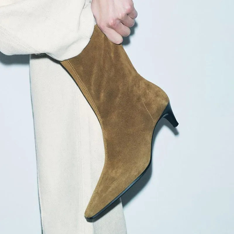 Brown women's square toe ankle boots with a side zipper and a mid kitten heel on a white background.