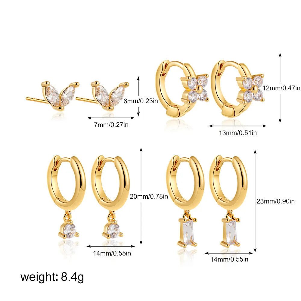 Geometric square earrings set with star shapes in gold or silver metallic finish