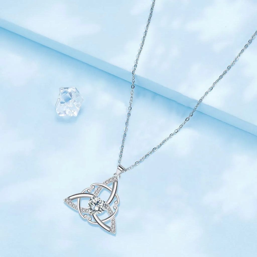 Geometric Celtic knot pendant necklace for women in electroplated copper, showing colour options.