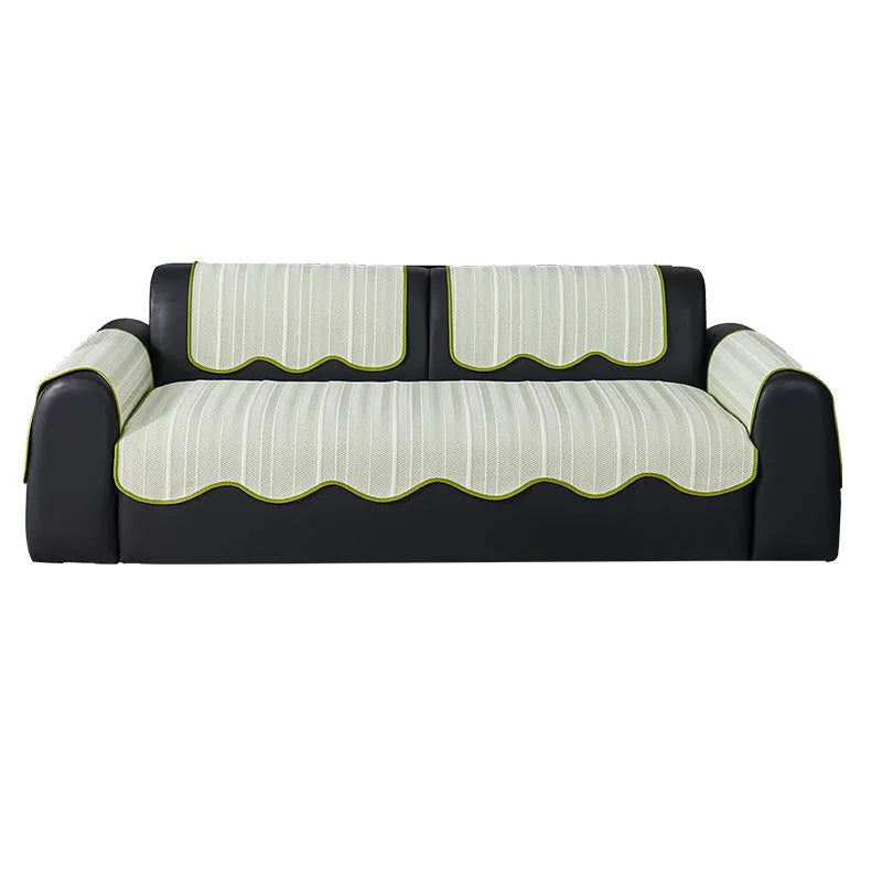 Ice Silk special-pattern sofa cover in Jelly Green laid over a grey sofa, showing non-slip edges.