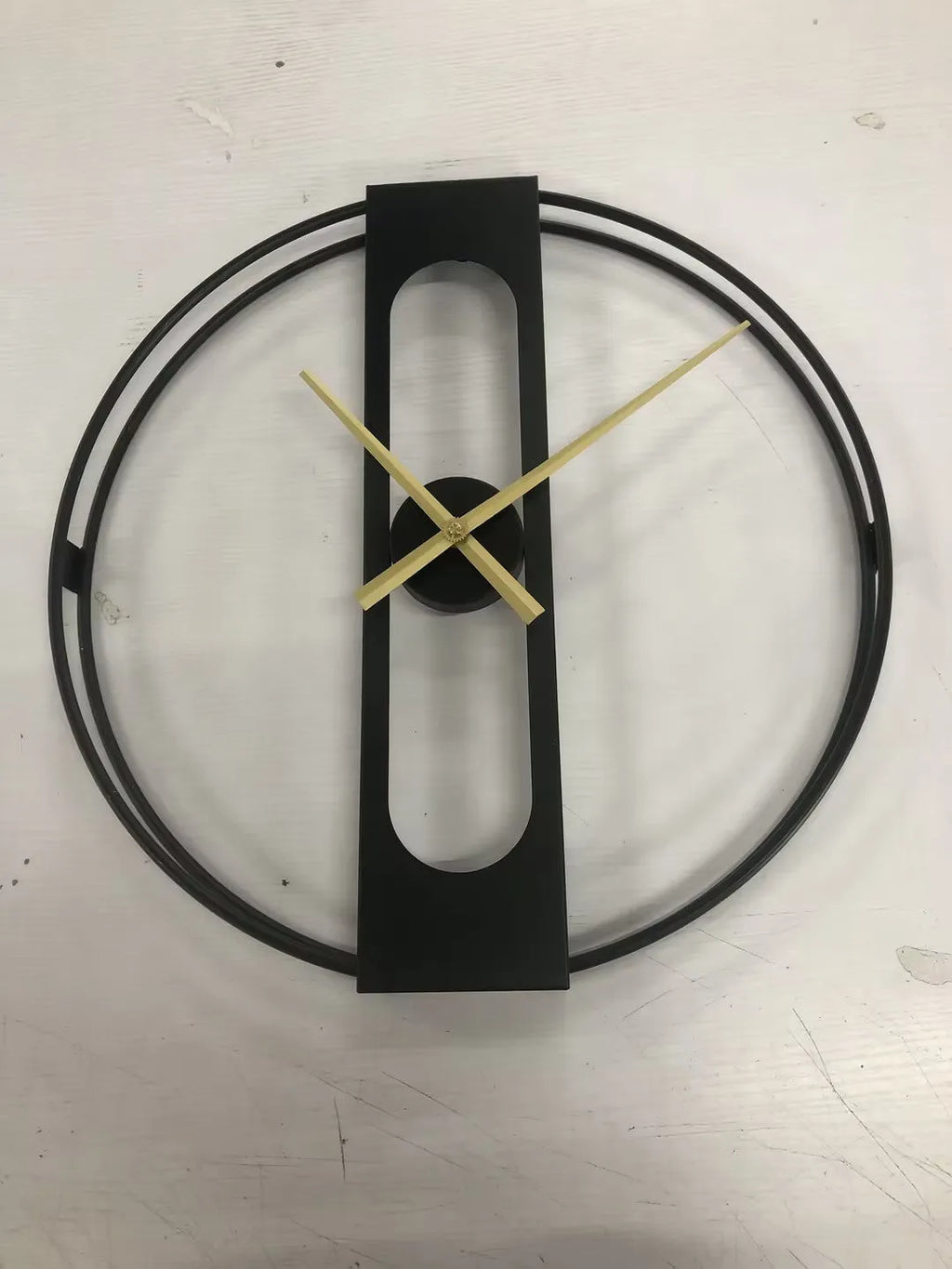 50cm round metal wall clock in black or gold finish with clear hour markers