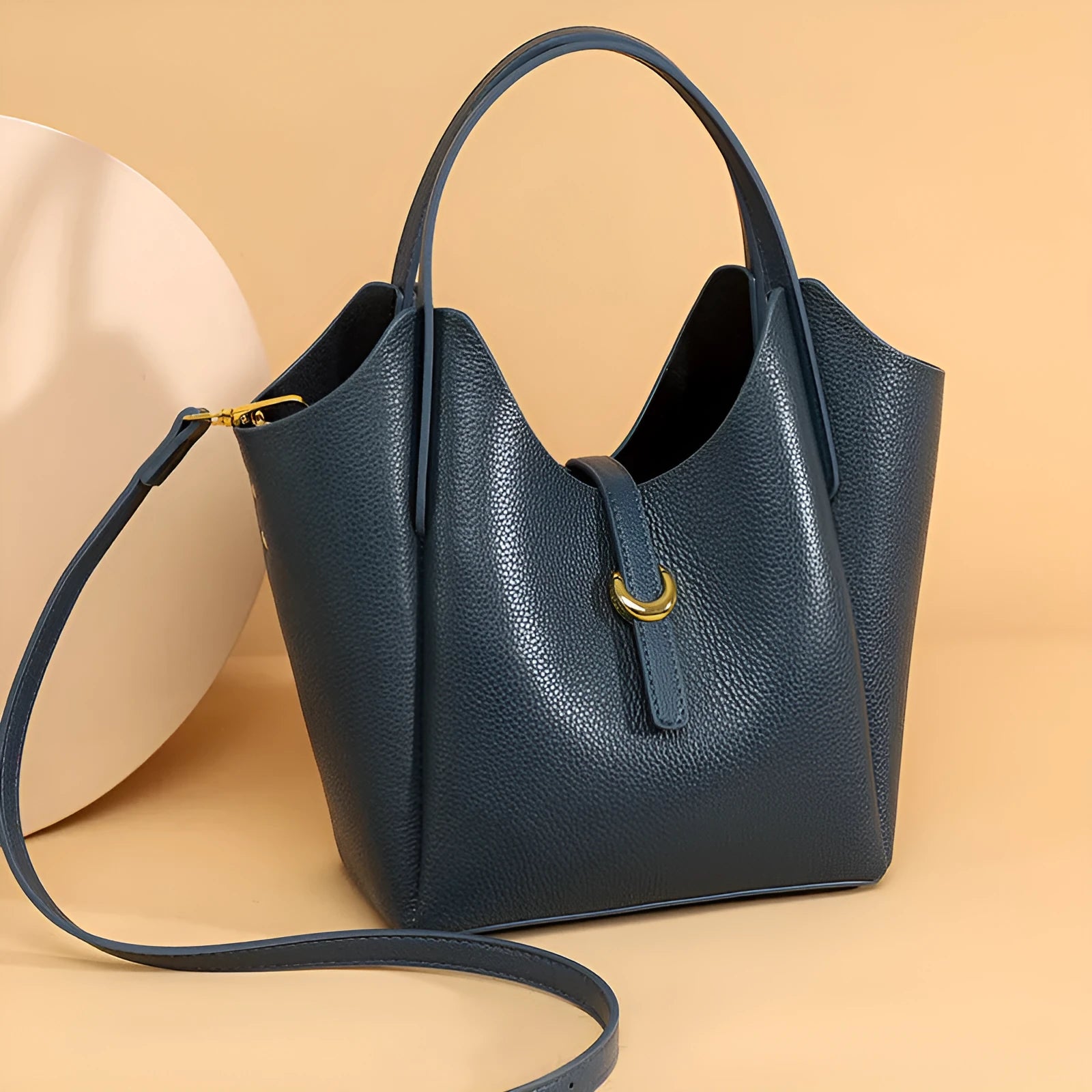 Genuine leather women's bucket bag in European retro style with hand holding strap
