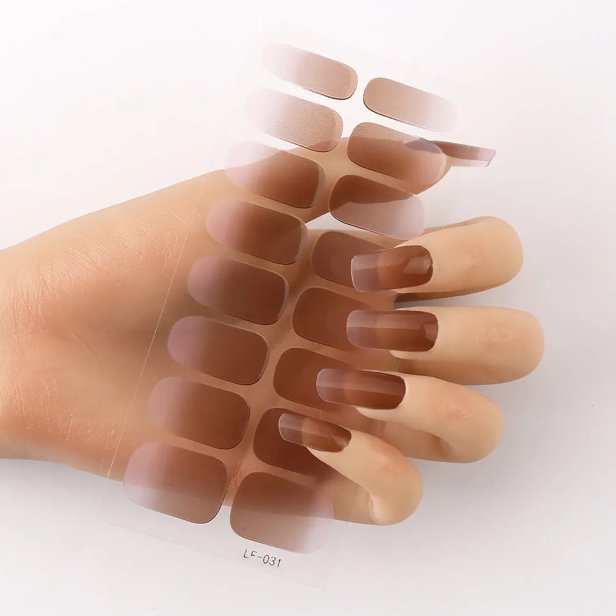 Set of 16 solid colour nail art stickers showing floral, geometric, and pattern designs for manicure application