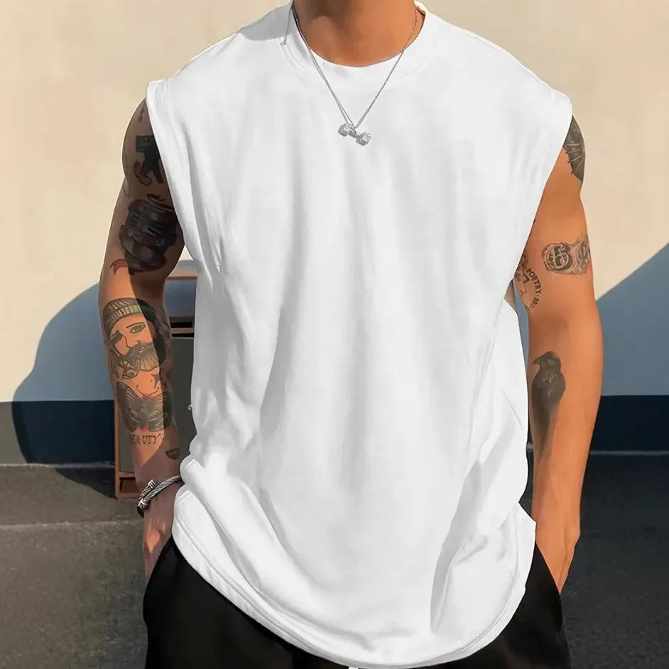 Men's loose solid colour cotton tank top on hanger showing straight hem design