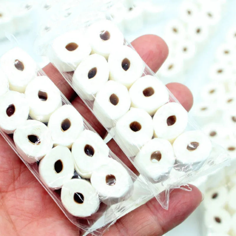 Small paper model of a tissue roll for dollhouse play, measuring 30mm by 15mm by 80mm.