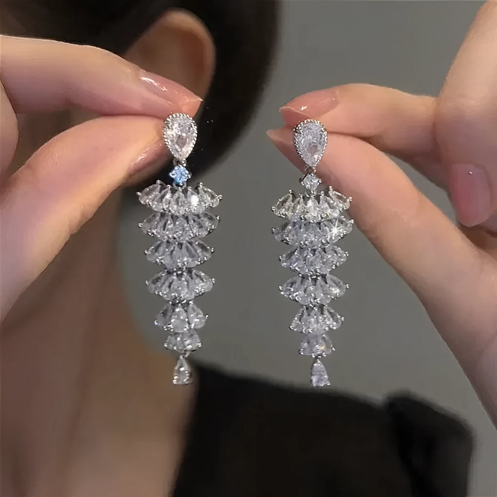 Silver pagoda Christmas tree drop earrings with sparkling zircon stones and copper construction