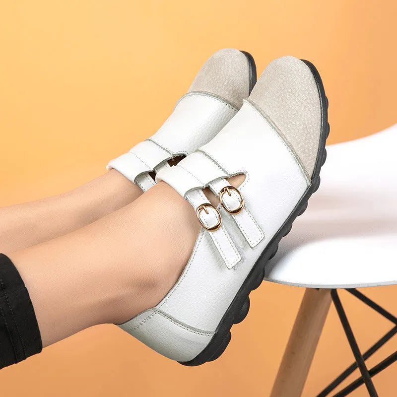 Men's brown leather casual flat shoes with Velcro strap, shown on a white background.