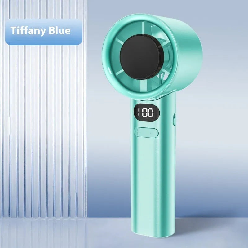 Handheld fan showing variable speed control, USB charging port, and green colour option