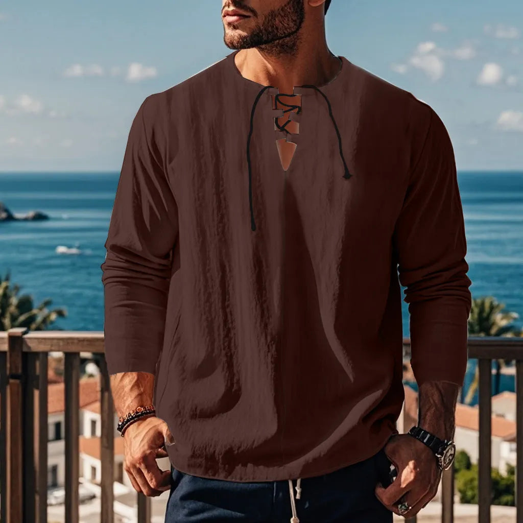 A man wearing a loose-fit solid colour cotton linen blend casual shirt.