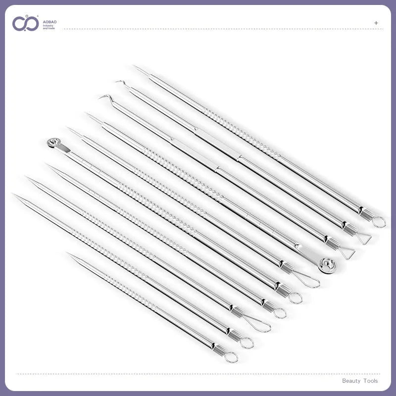 Four metal acne needles with pointed tips arranged on a clean surface.