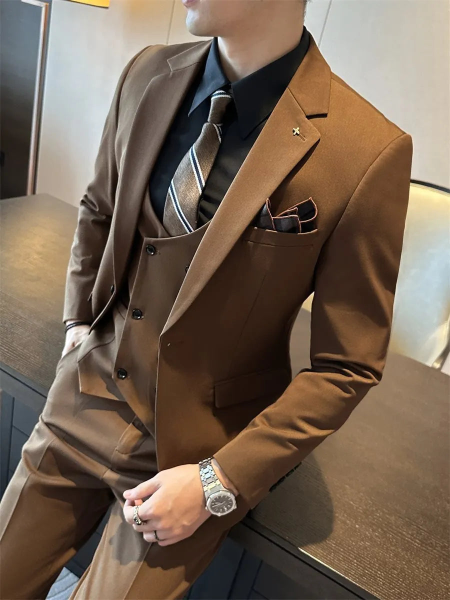 Men's slim fit business formal jacket and trousers in a dark green chemical fibre blend fabric.