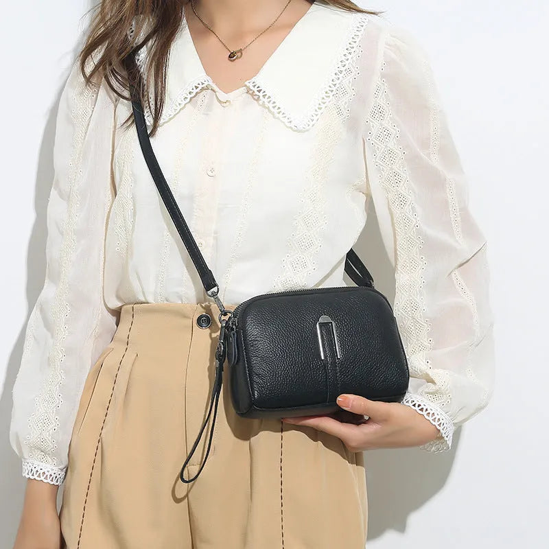 Women's genuine leather shoulder bag in square design with dimensions 19cm by 13cm by 6cm