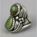Turquoise geometric alloy ring with retro inlaid design on a woman's hand
