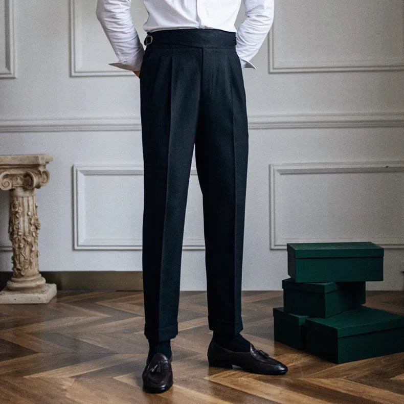 Men's high waist straight leg casual trousers in black polyester fabric on a hanger.