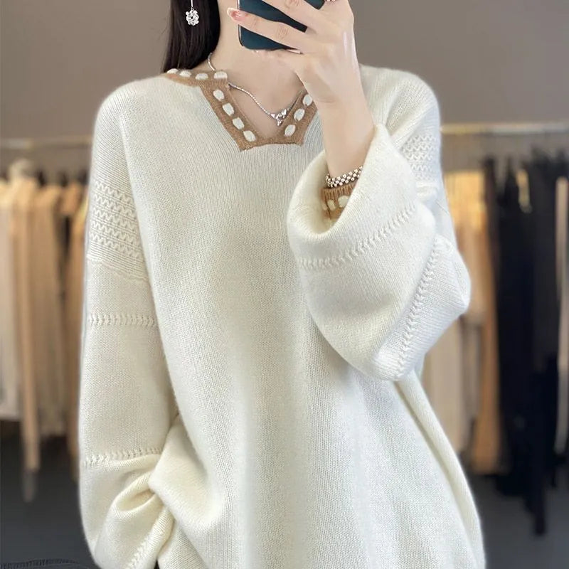 Women's camel and white V-neck viscose sweater with long sleeves showing pullover design