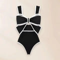 Women's one-piece swimsuit with beach dress style featuring bow detail and round skirt in polyester fabric