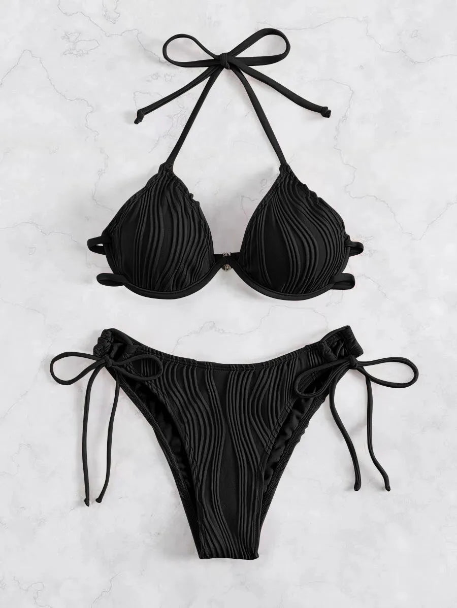 Women's apricot coloured bikini swimsuit with steel underwire bracket on a mannequin.