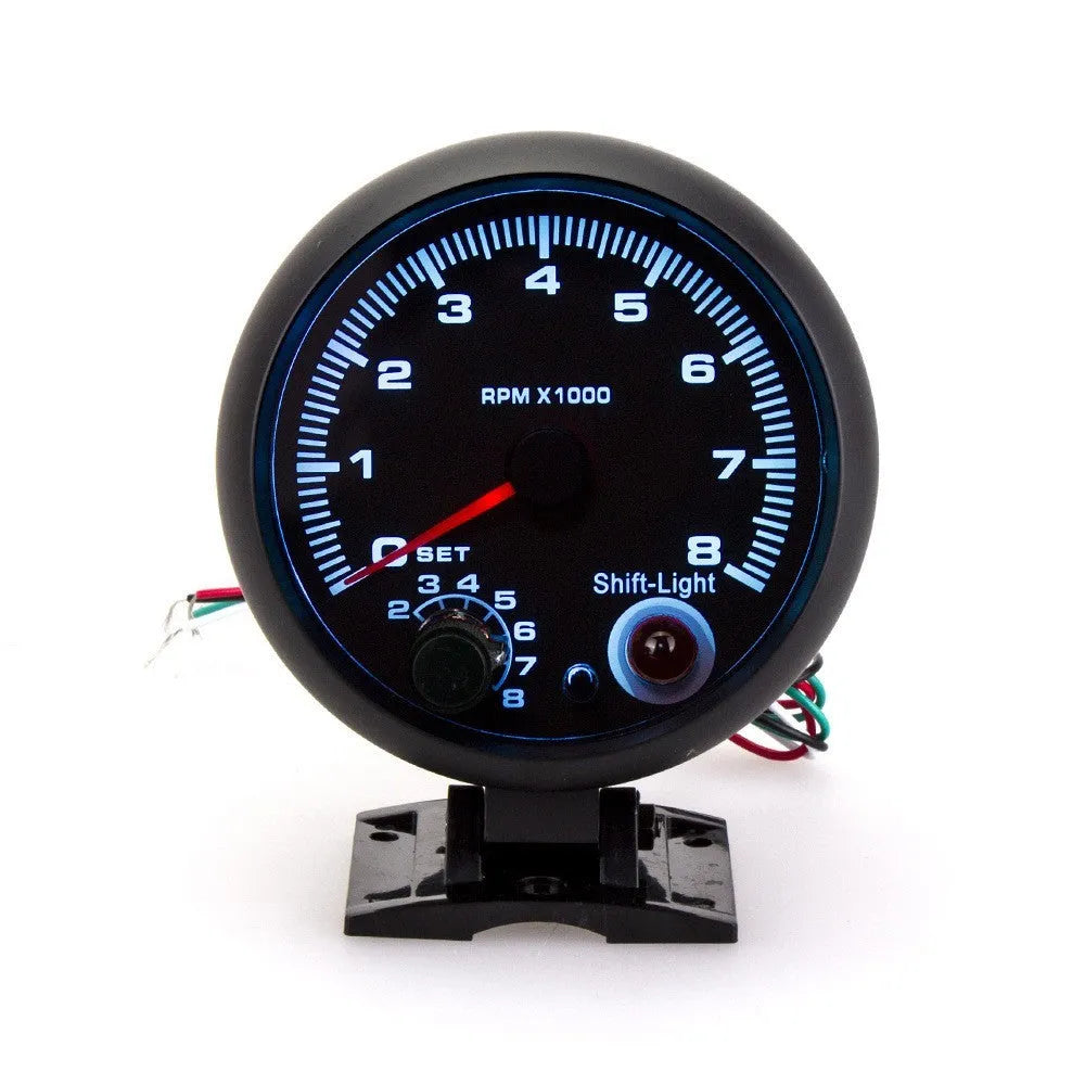 Blue laser automotive tachometer with digital display showing 0-8000 rpm range