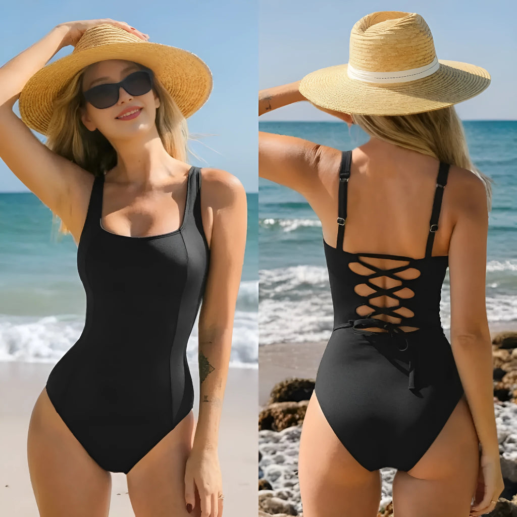 Black sports one-piece swimsuit with chest pad on female model