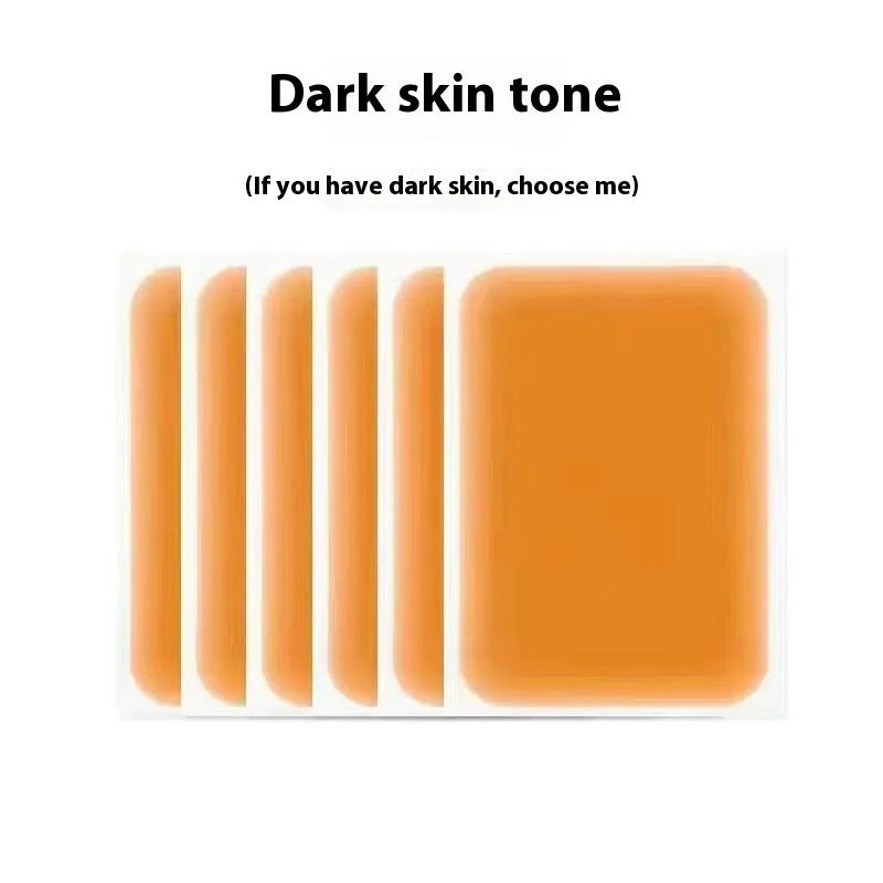 Pack of adhesive tattoo cover patches in various skin tone colours on a white background.