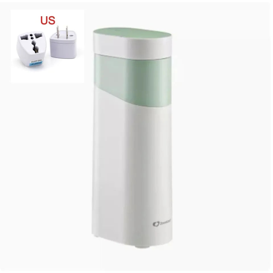 Black or green small instant water dispenser with digital display on a desktop.