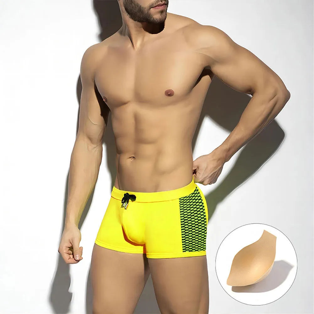 Men's polka dot print quick-dry swimming boxers in black, dark blue, or yellow.