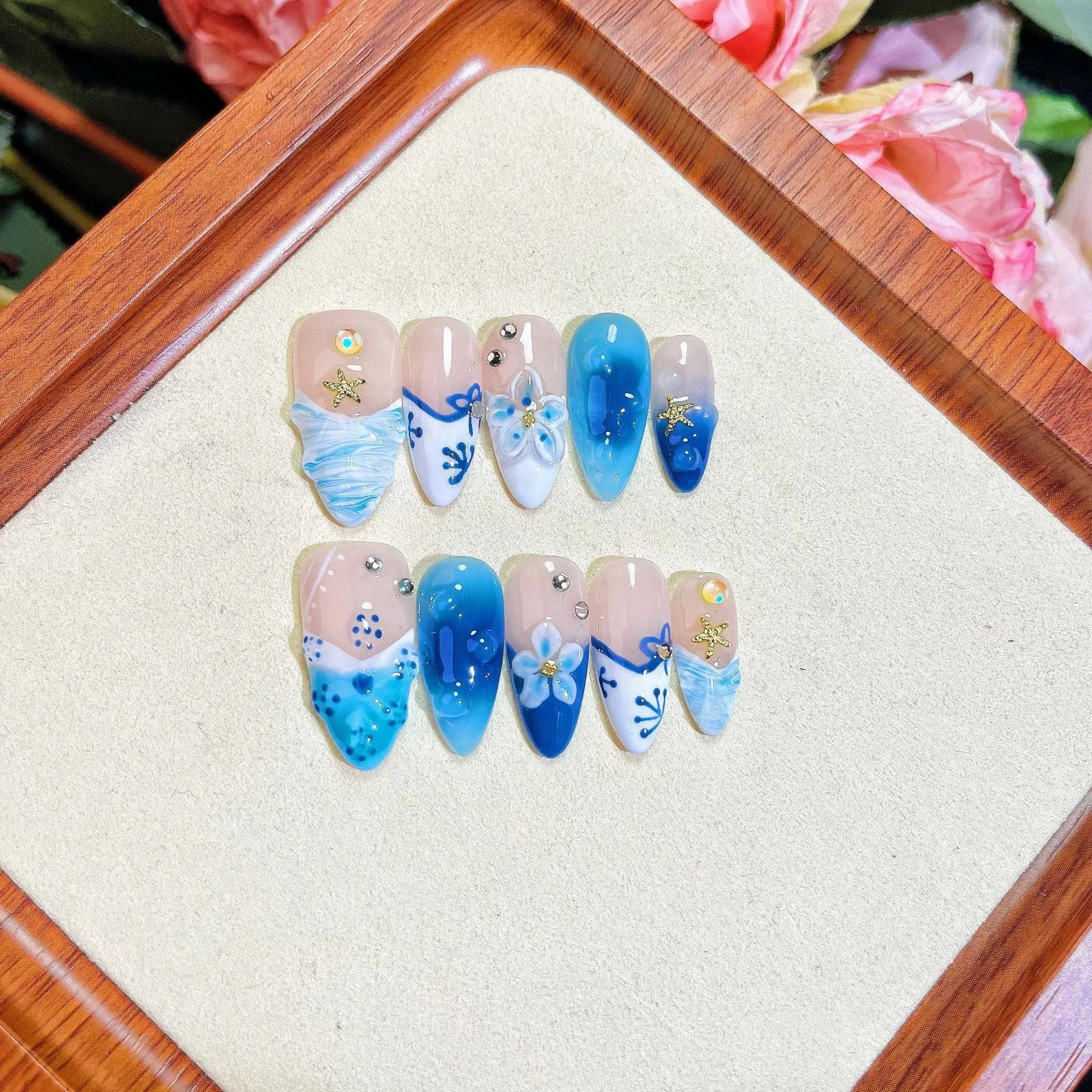 Blue hand-painted carved summer ice transparent fake nails set with plastic wearable armour