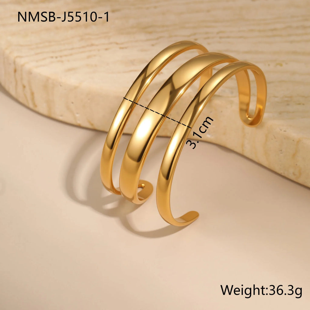 Geometric line design stainless steel women's bracelet with a simple opening clasp, shown in gold and steel colour options.
