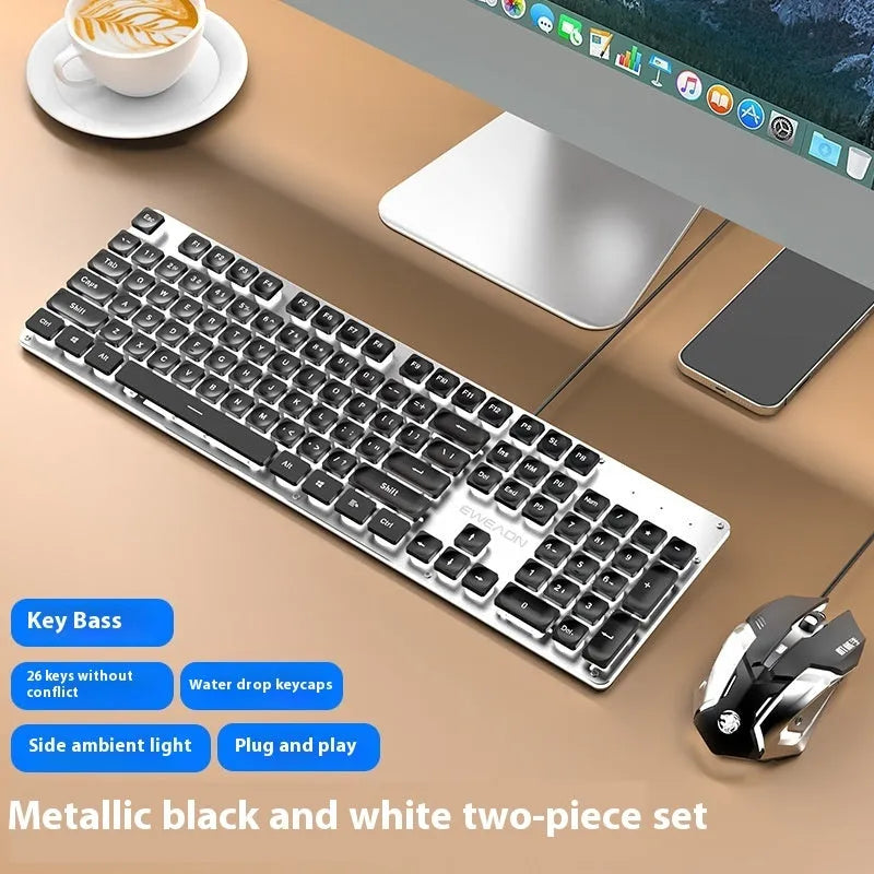 Wired mute keyboard with mechanical feel keys, shown in a Metal Black case with blue LED backlighting.