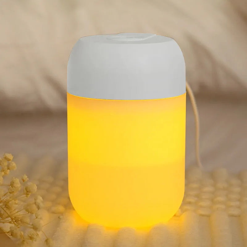 White cylindrical USB-powered humidifier with aromatherapy function on desk