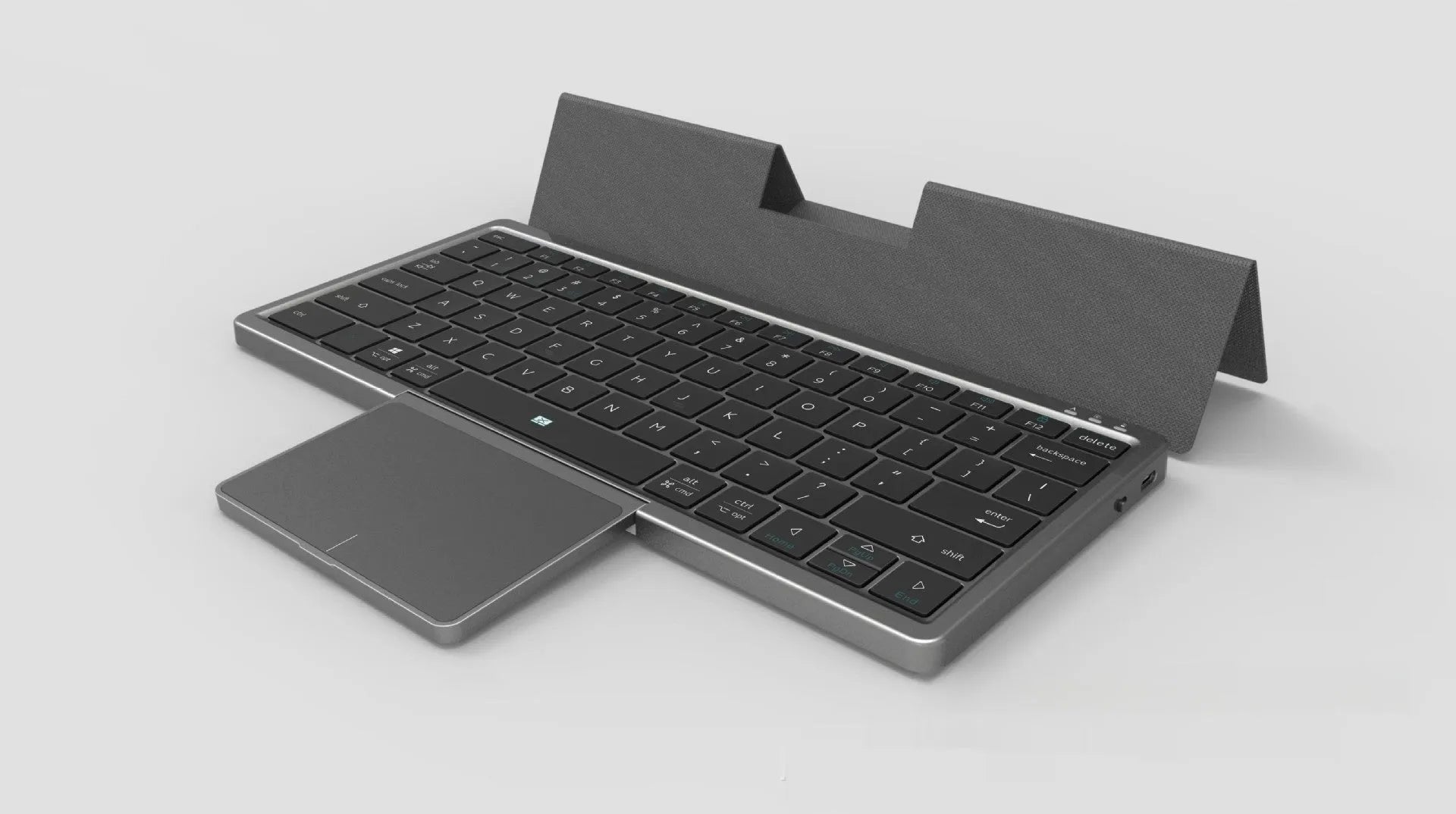 Black and grey three-in-one wireless Bluetooth keyboard with touch pad and leather sheath stand for iPad.