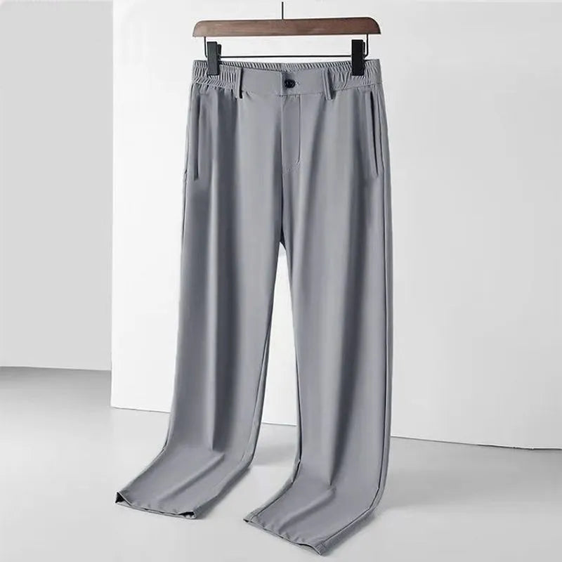 Men's straight-leg ice silk trousers in a loose fit with an elasticated open waistband.