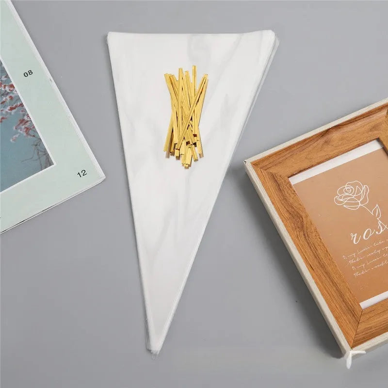 Transparent triangle-shaped plastic OPP bag with a silver tie wire closure, shown in a pack.