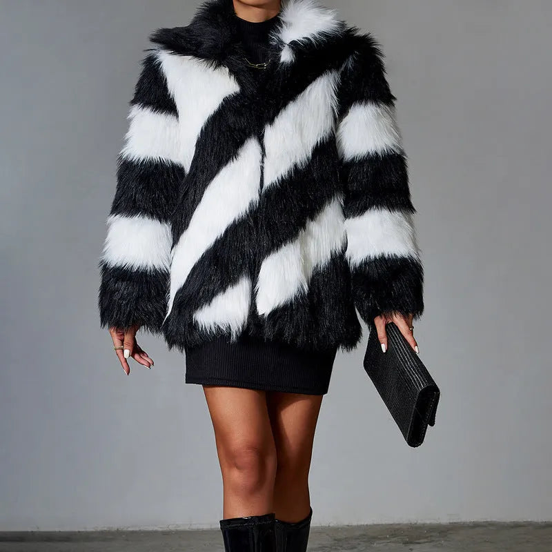 Women's faux fur coat with contrast lapel and fur collar in mid-length design