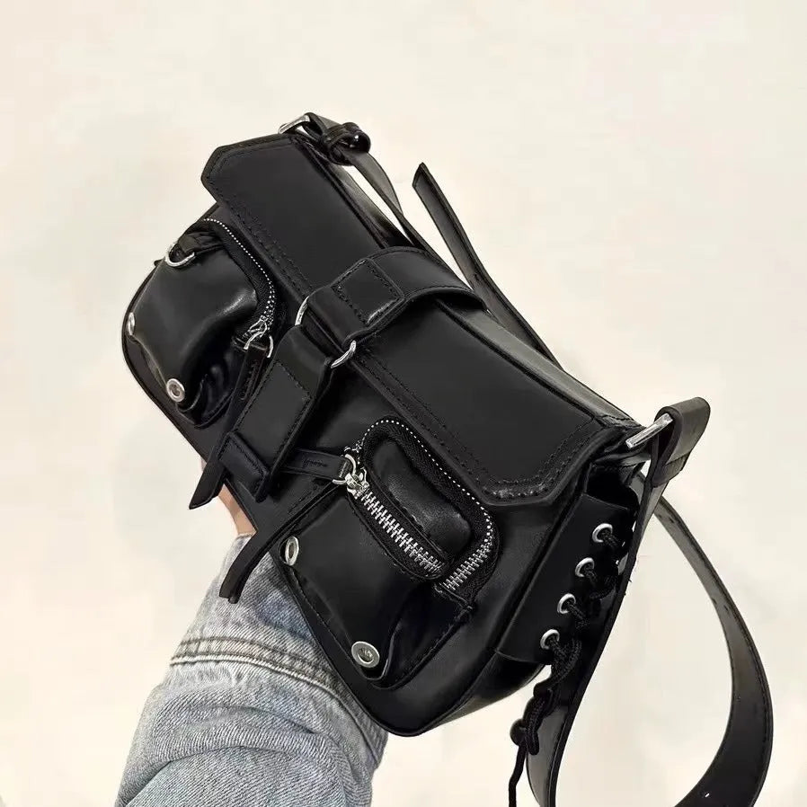 Black structured PU leather women's baguette messenger bag with adjustable long shoulder strap.