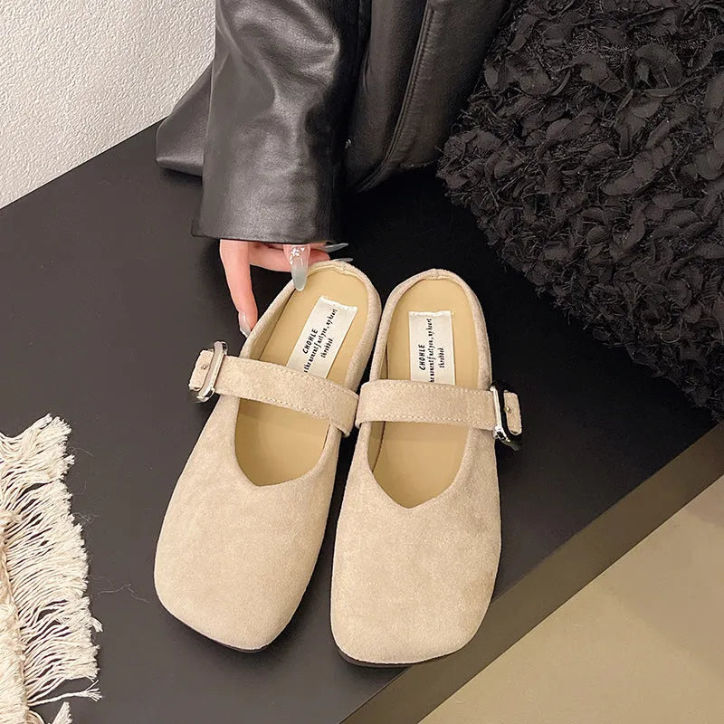Women's flat closed toe half slippers in PU with rubber sole and square toe shape