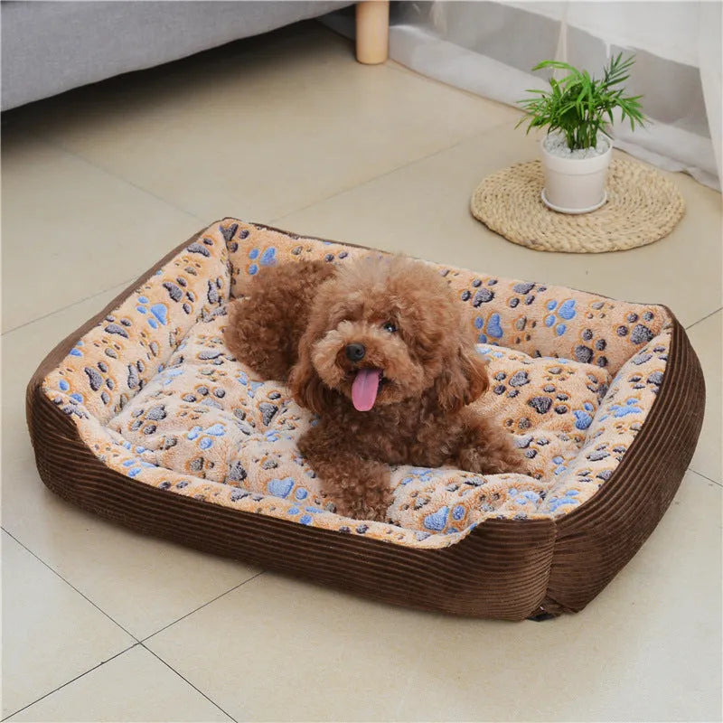 Beige plush bolster dog bed for a small dog, showing raised edges and soft fabric.