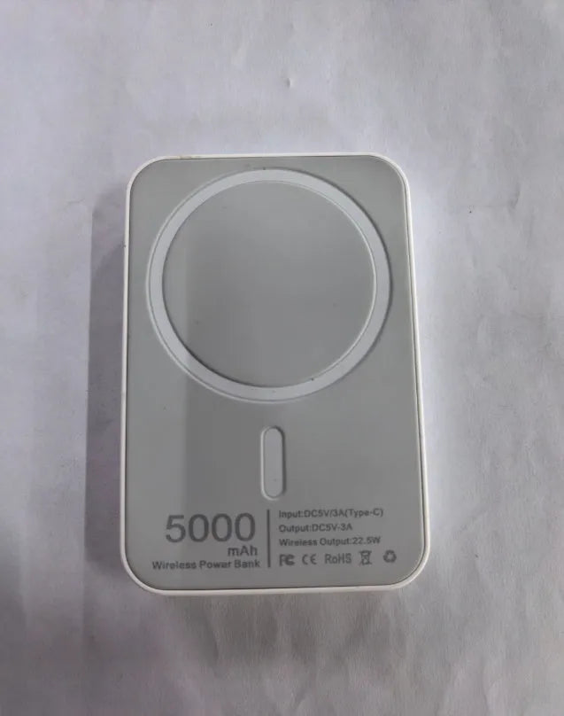 Magnetic wireless charger power bank in white with 5000mAh capacity measuring 100x65x16mm