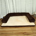 Corduroy pet dog bed sofa in a neutral colour with a raised edge and non-slip base.