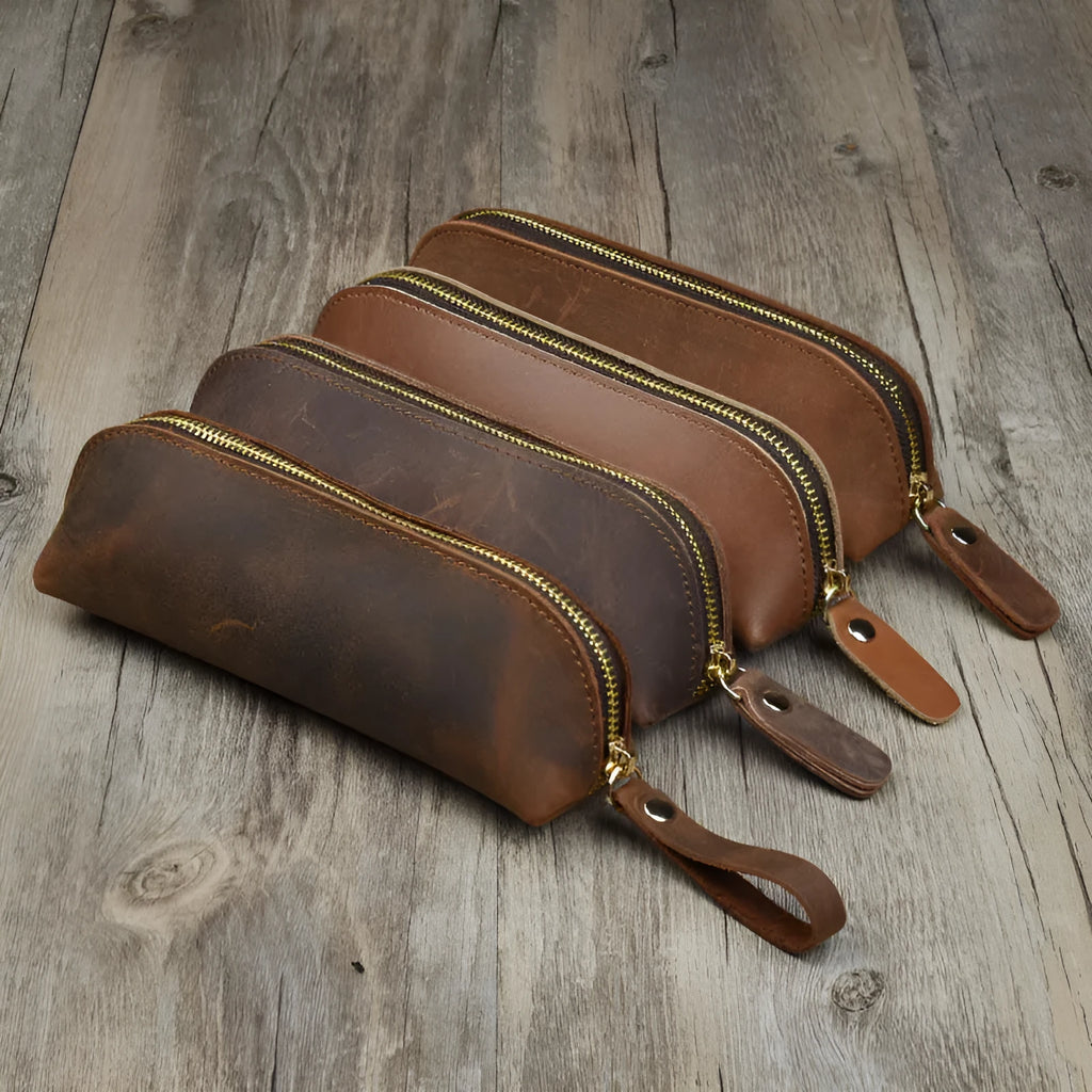 Handmade square leather pencil and glasses case with zipper, shown in black colour.