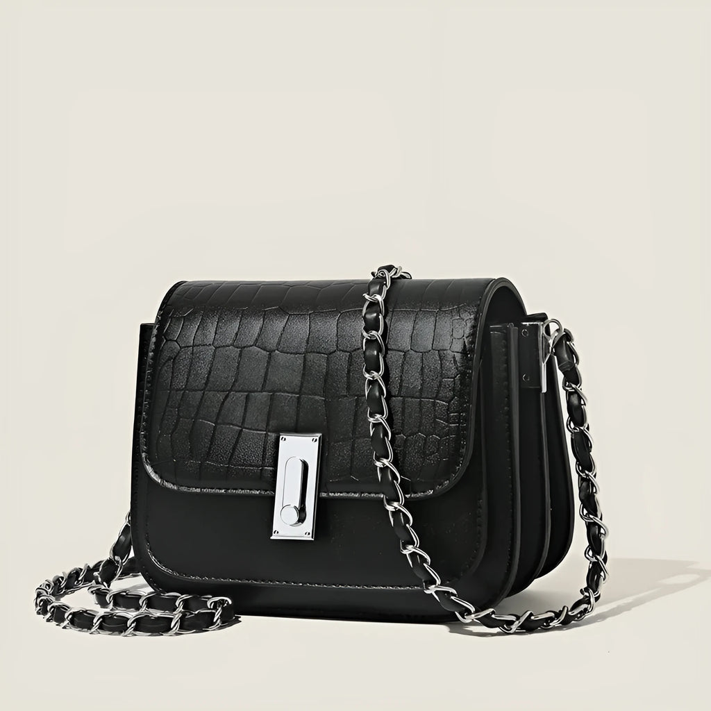 Soft PU women's cross-body shoulder bag with sandwich pocket and internal phone compartment in black colour