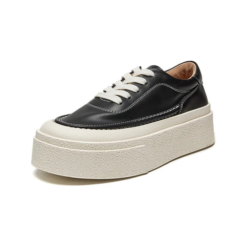 Women's black platform casual sports shoes with embossed cowhide upper and round toe design