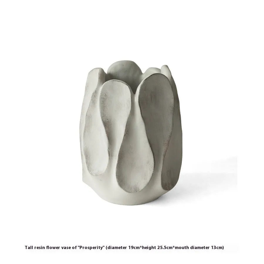 Irregular ceramic vase for flower arrangements in handcrafted design