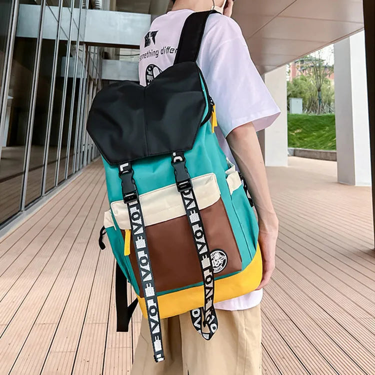 Oxford cloth backpack in black, green, or red with multiple carry handles