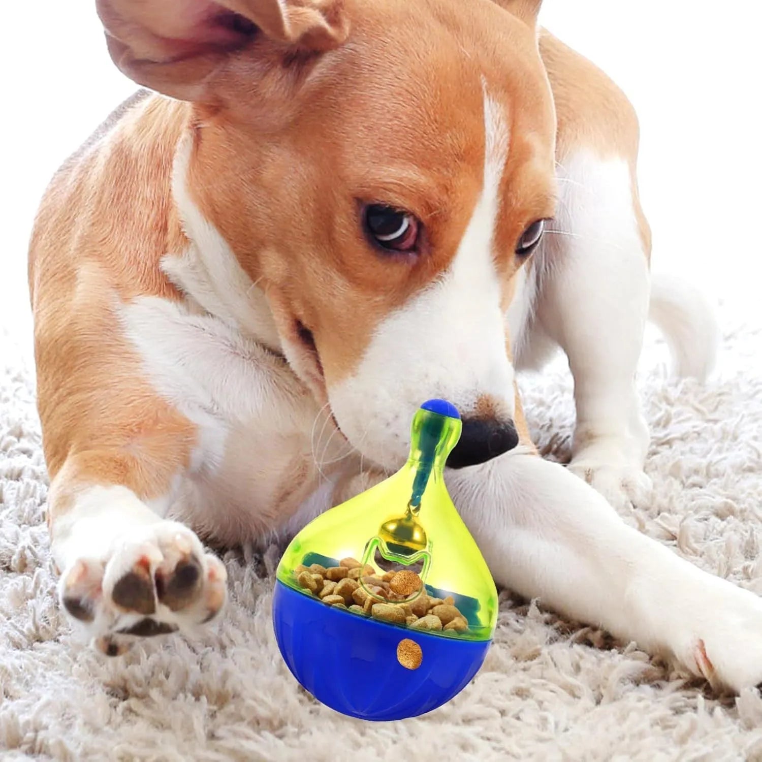 Blue and white durable pet treat dispenser tumbler toy for dogs and cats on a wooden floor.