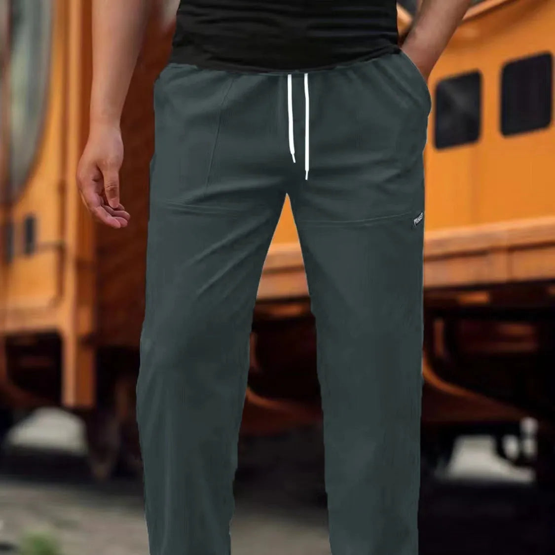 Men's polyester trousers for spring and autumn available in multiple colours and sizes