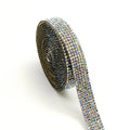 Self-adhesive glass water drill strip on a one-yard reel for shoe and clothing decoration.