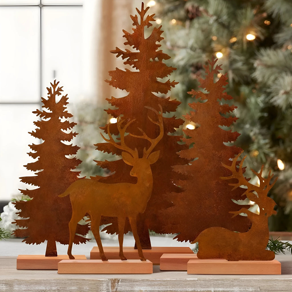 Three metal Christmas tree elk decorations with rusty patina finish displayed together