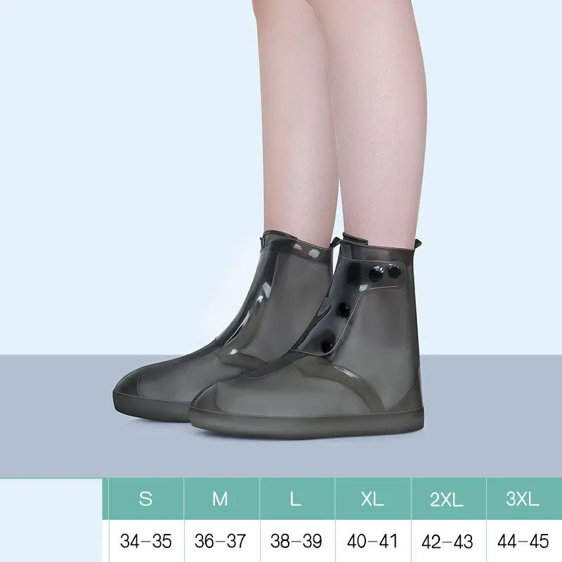 White high top PVC reusable waterproof shoe cover for women, shown on a foot.