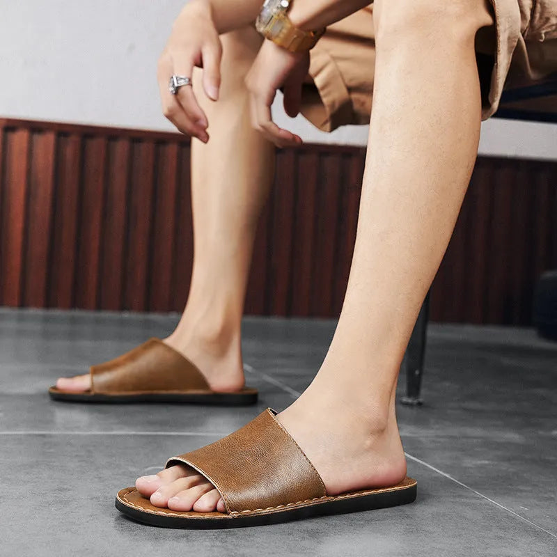 Men's brown leather casual sandals with a rubber sole on a white background.